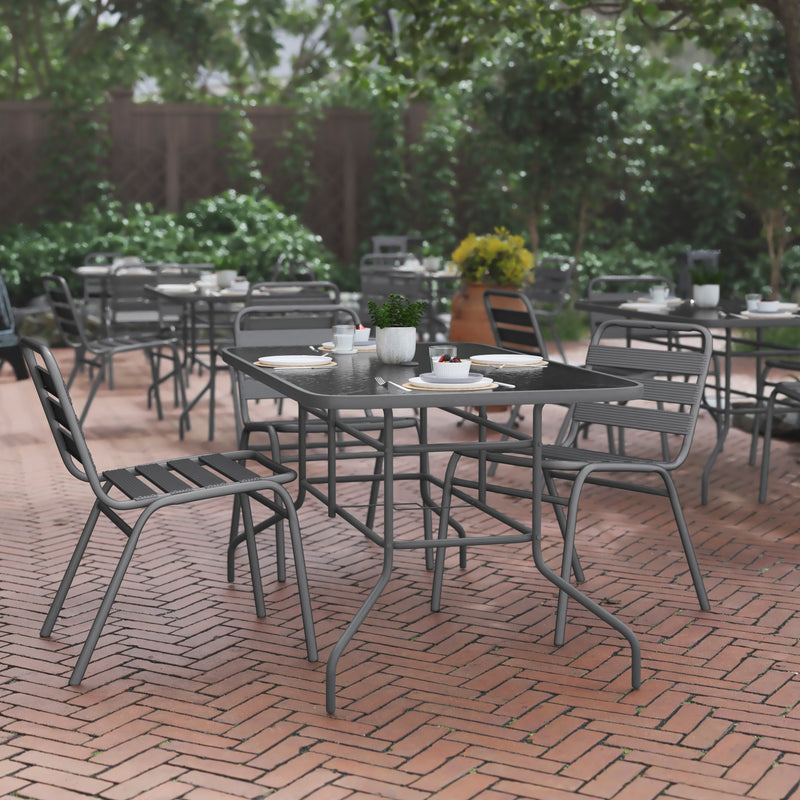 Lila 5 Piece Patio Dining Set - 55" Tempered Glass Patio Table with Umbrella Hole - 4 Black Metal Aluminum Slat Stack Chairs